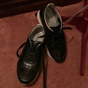 Hogan Black Sequin Runners with silver detail on the wedge and collar.